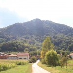 photo ©EMRE d.o.o. Village Podevcevo with parking and signs to Cevo mountain road
